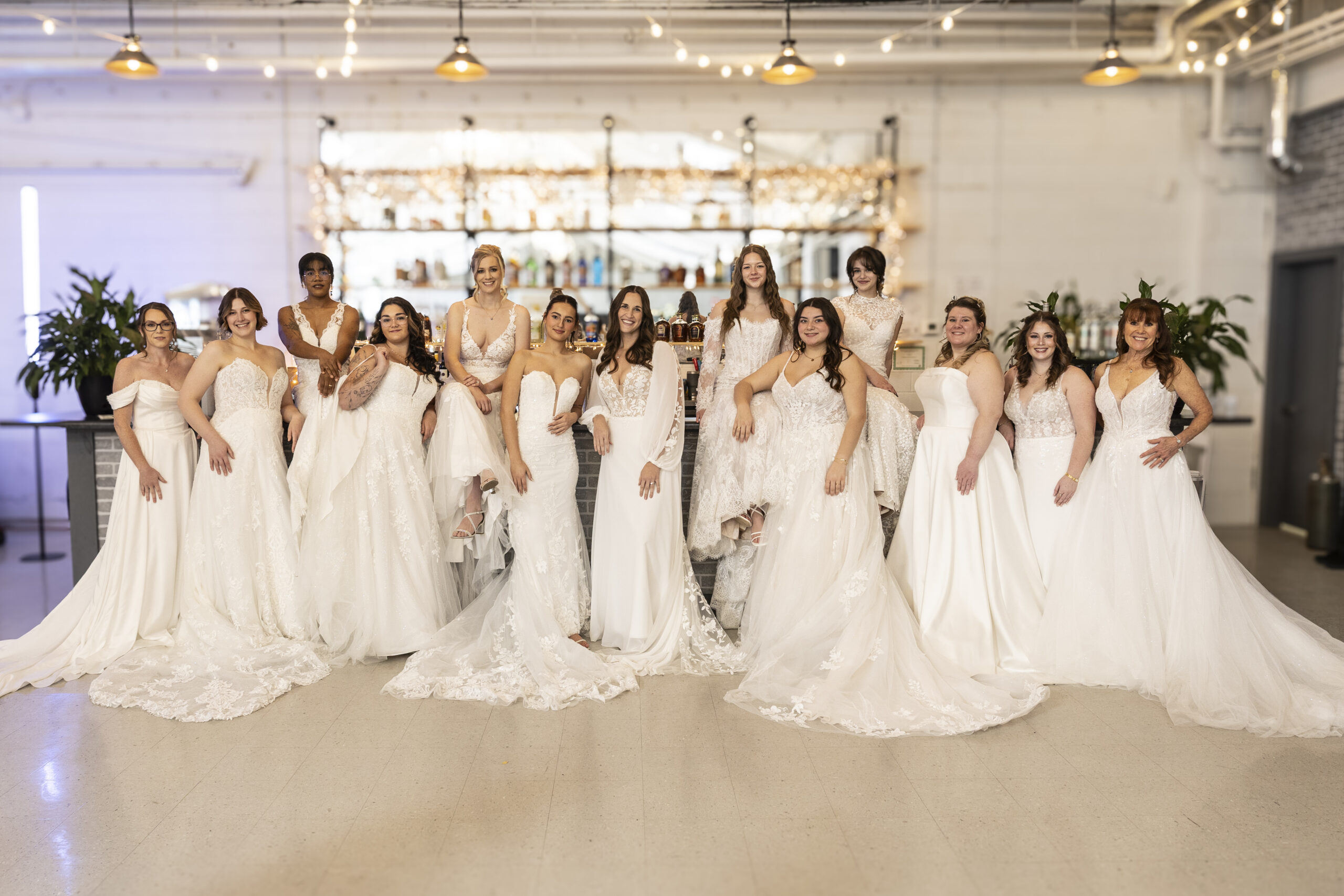 Elegant Brides wearing a selection of carefully curated wedding dresses.
