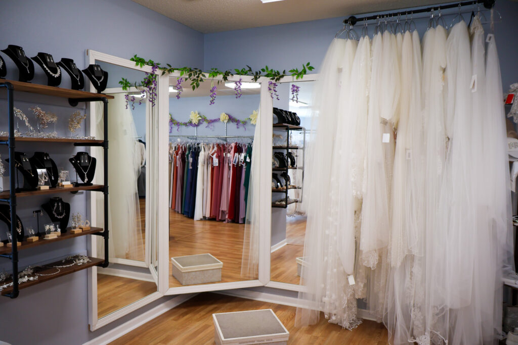 An Elegant Brides dress consultation area with veils and other bridal accessories.