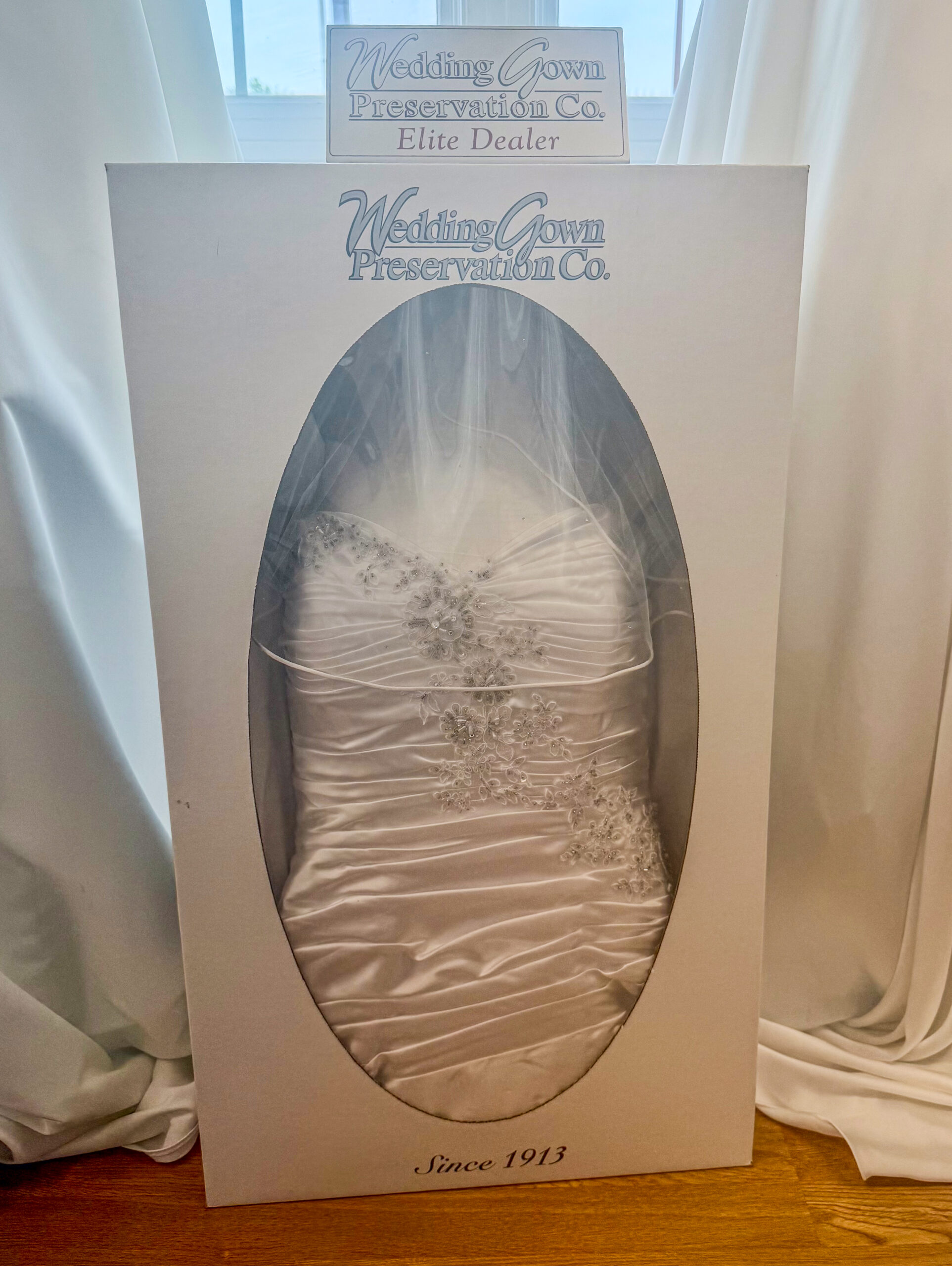 A preserved wedding dress done through Elegant Brides's partner, Wedding Dress Preservation Co.