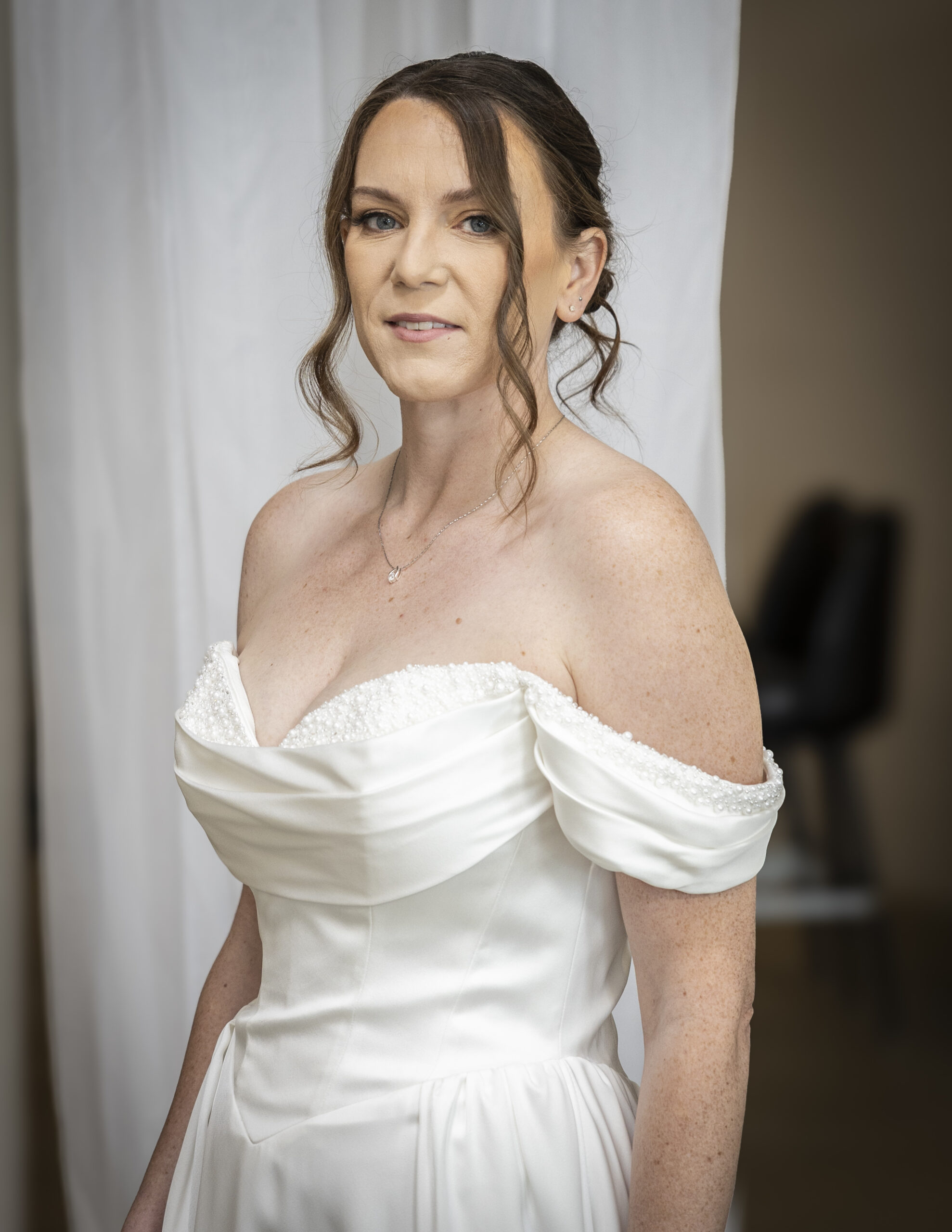 A bride in wearing the SY 8236 wedding dress.